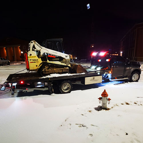 Equipment Transport | Hook Em' Up Towing